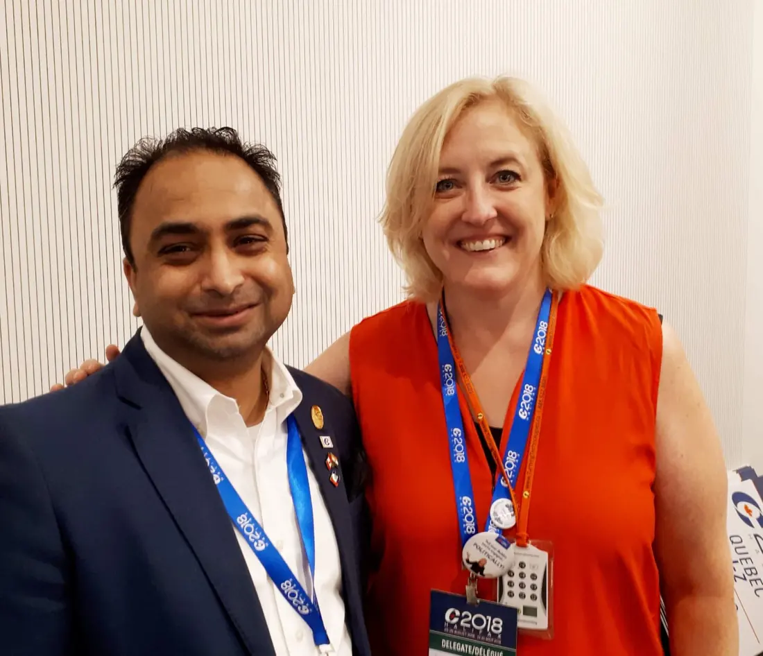 Husain at a delegate conference