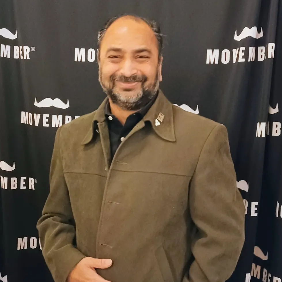 Husain at a Movember event